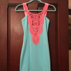 Lulu’s turquoise mini dress with pink lace
